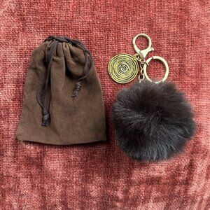POM POM SPIRAL BAG CHARM Brown Gold Tone Hardware
